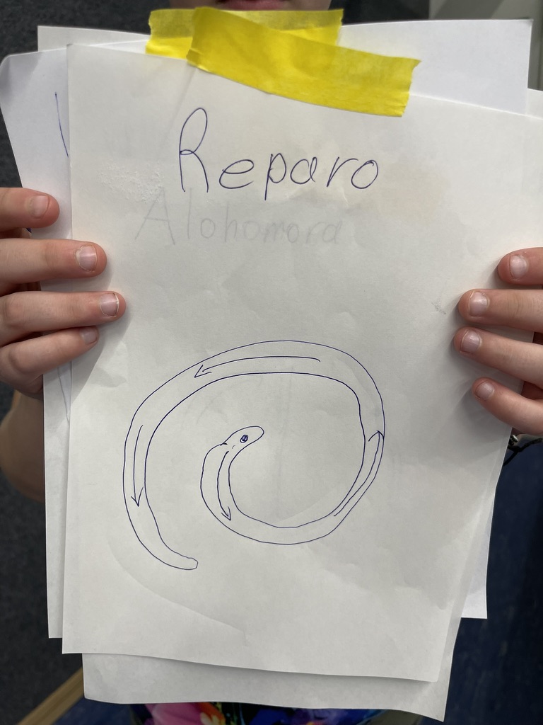 Zeichnung mit Symbol des Reparo Zaubers aus Hogwards
